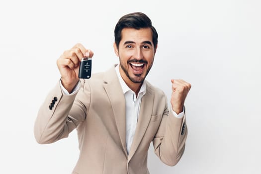man white male holding credit beige buy hand guy business auto key automobile service alarm car background keyboard locking beard smile