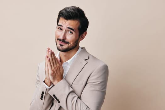 posing man folded business smiling successful confident stylish beige model suit copyspace businessman person happy professional portrait occupation standing handsome success