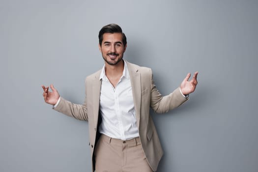 man crossed handsome happy model businessman smiling copyspace suit smile white business isolated job fashion portrait stylish formal folded beige professional
