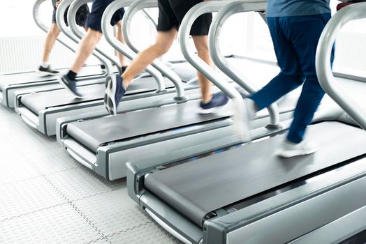 gym shot - people running on machines, treadmill