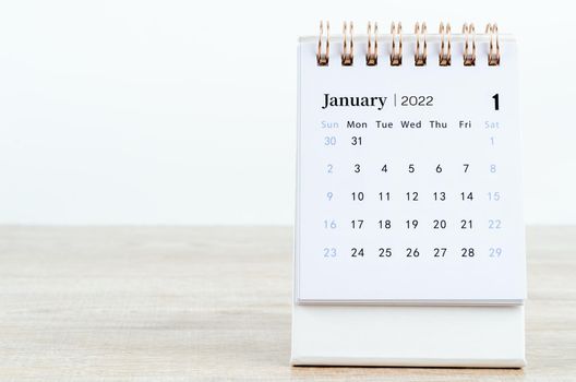 January calendar 2022 on wooden background.
