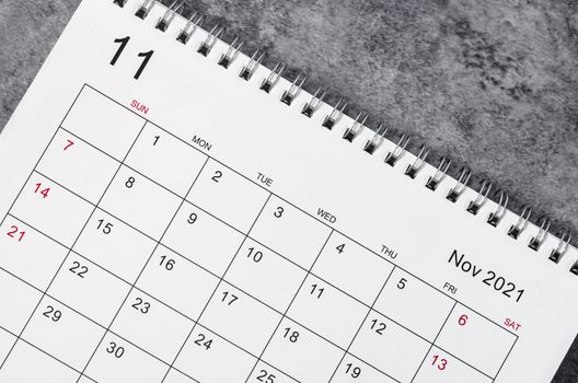 November Calendar 2021 on wooden table background.
