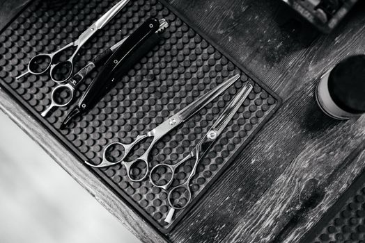 Vintage barber scissors set, black and white style, flat lay