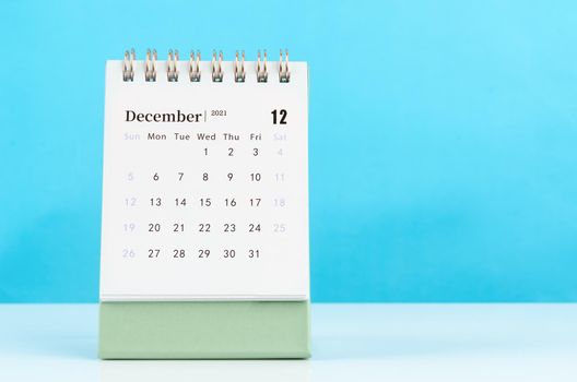 December Calendar 2021 on blue background.