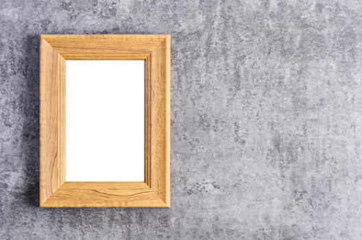 Empty wooden frame on dark background, Save clipping path.