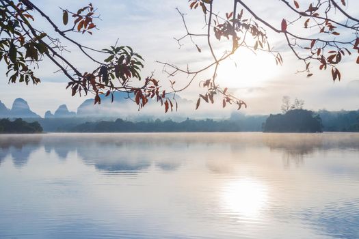 Ban Nong Thale the natural scenery of the sunshine in the morning (mountains, lakes, trees, fog) at Krabi, Thailand.
