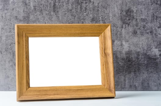 Empty wooden frame on dark background, Save clipping path.