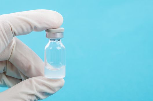 Close up injecting vaccination medicine on man doctor, medical concept.