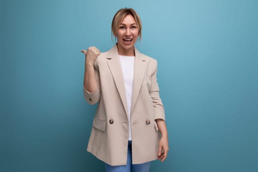 smart european young woman in jacket got brilliant idea on studio background.