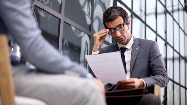 Business people Having Meeting Around Table In Modern Office