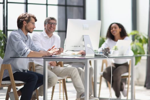 Conversation between managers and employees in the office