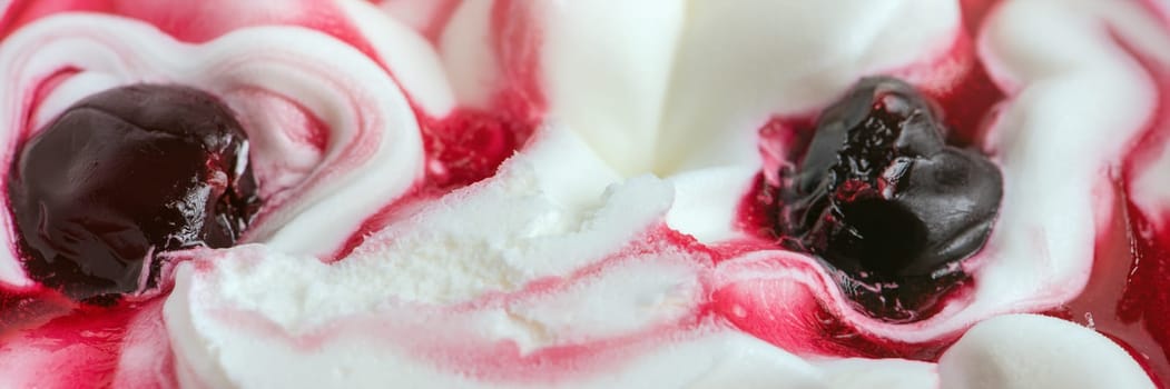 Texture of cherry ice cream. Fresh and delicious ice cream with cherries is a tasty treat for children and adults. High quality photo