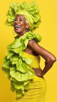 Adult African American woman smiling in a photo studio wearing a yellow dress with lettuce leaves on a yellow background. Generative AI. High quality photo