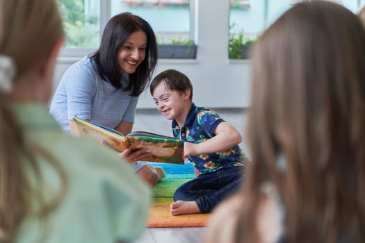 Reading time in an elementary school or kindergarten, a teacher reading a book to children in an elementary school or kindergarten. The concept of pre-school education. Selective focus.