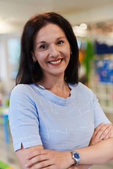 Portrait of a teacher in a preschool institution, in the background of the classrooms. High quality photo