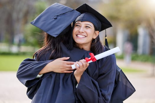 Graduate, education and woman friends hugging at a university event on campus for celebration. Graduation, certificate and hug with female students together in support of a scholarship achievement.