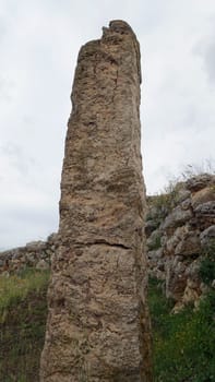 Sassari, Sardinia in Italy, May 18 2023. A menhir in front of the sacred altar of Monte d'Accoddi. Dating back to 4000 BC.