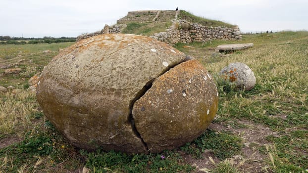 Sassari, Sardinia in Italy, May 18 2023. Some sacred stones in front of the sacred altar of Monte D'Accoddi. Dating back to 4000 BC.