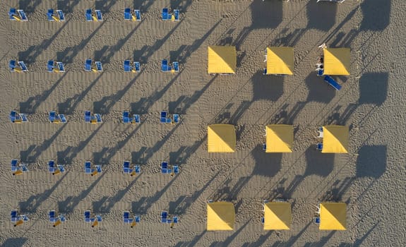 Aerial view of the Tuscan Versilia beach photographed from above in the evening 