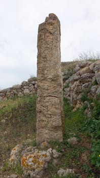 Sassari, Sardinia in Italy, May 18 2023. A menhir in front of the sacred altar of Monte d'Accoddi. Dating back to 4000 BC.