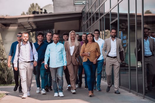 A diverse group of businessmen and colleagues walking together by their workplace, showcasing collaboration and teamwork in the company