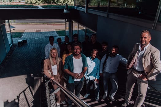 A diverse group of businessmen and colleagues walking together by their workplace, showcasing collaboration and teamwork in the company