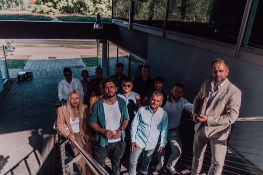 A diverse group of businessmen and colleagues walking together by their workplace, showcasing collaboration and teamwork in the company