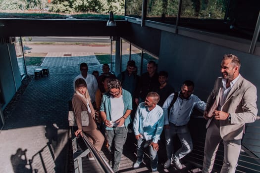 A diverse group of businessmen and colleagues walking together by their workplace, showcasing collaboration and teamwork in the company