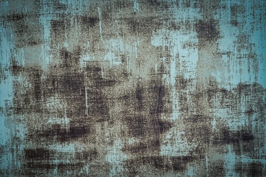 The background of an old iron sheet painted blue with rust spots. dirty blue background. grunge rusted metal texture, oxidized metal background. Old metal blue iron panel.