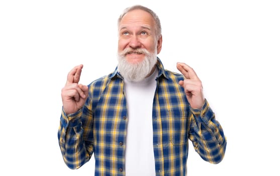 handsome 60s middle-aged gray-haired man with a beard in a cheerful disposition on a white background.