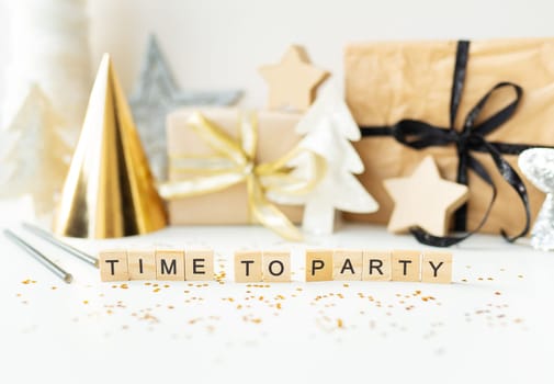 Christmas party time - confetti, gifts, tree, stars, glitter, ribbon. Party time lettering New year 2023-2024