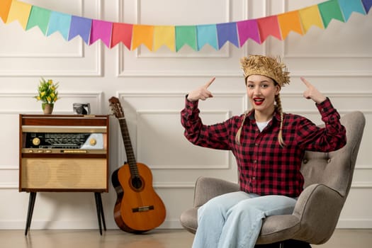 festa junina cute girl in straw hat brazilian midsummer with retro radio guitar pointing at hat