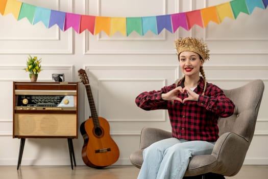 festa junina cute girl in straw hat brazilian midsummer with retro radio guitar showing heart hand