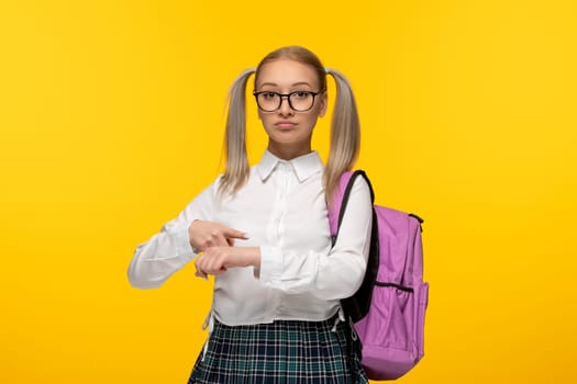 world book day blonde school girl in cute uniform with back pack