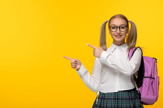 world book day happy cute school girl in uniform with pink backpack