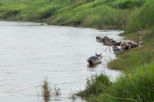 old wood boat parking on the river