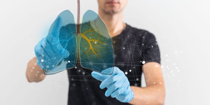 Creative image of medical worker with glowing interface of lungs and virus on blurry background. Medicine, healthcare and pandemic concept. Double exposure. High quality photo
