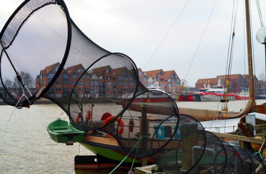 Close-up of a fishing net on a boat in a harbour in Germany. It´ s a fyke net, a bag-shaped net held open by hoops.