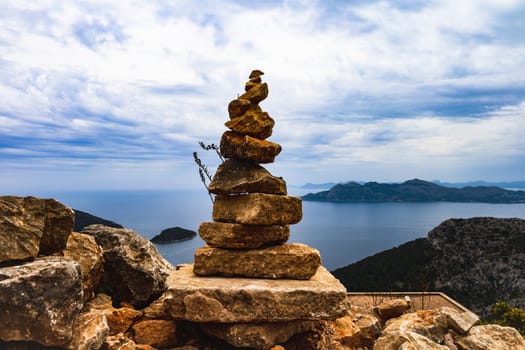 Cairn against a magnificent coastal backdrop. High quality photo