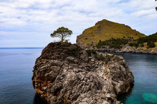 Rock in the mediterranean sea. High quality photo