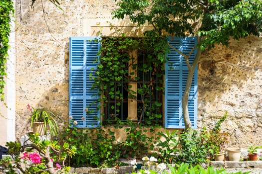 Window with shutters of a mediterranean house . High quality photo