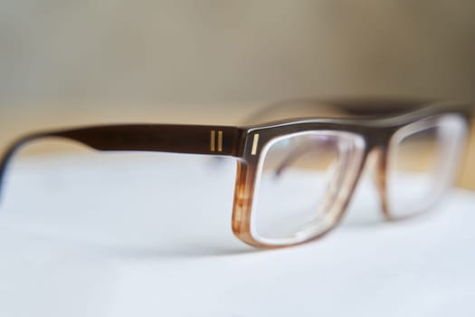 Fashionable brown eyeglass frame. Glasses for myopia. Close-up