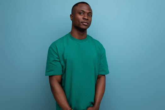 young successful handsome handsome american guy dressed in basic t-shirt isolated with copy space background.