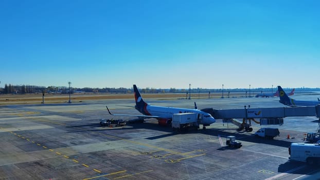 Boryspil, Ukraine - January 31, 2022: Airport panoramic view. Airport apron overview. Aircrafts at the airport gates. Kiev Boryspil International airport