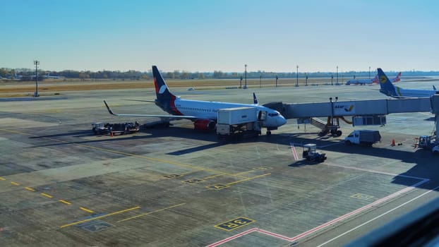 Boryspil, Ukraine - January 31, 2022: Airport panoramic view. Airport apron overview. Aircrafts at the airport gates. Kiev Boryspil International airport