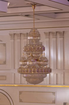 Chandelier, luxury retro style on classic background, vertical.