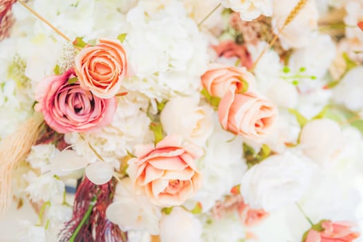 Overexposed pink floral wedding decoration background.