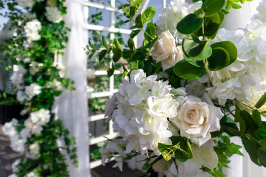 Luxury elegant beautiful wedding summer decoration with flowers outdoor.