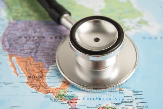 Bangkok, Thailand June 1, 2022, Stethoscope on United America world globe map background.