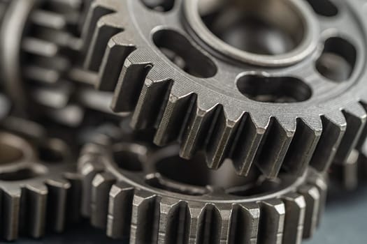 Gear and cogs wheels, clock mechanism, brass metal engine industrial.